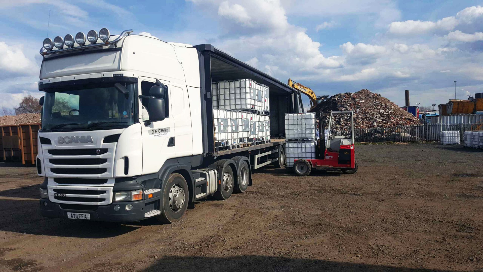 Curtainsider being loaded by Moffett