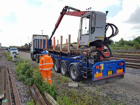Loaded with redundant track rail for Network Rail